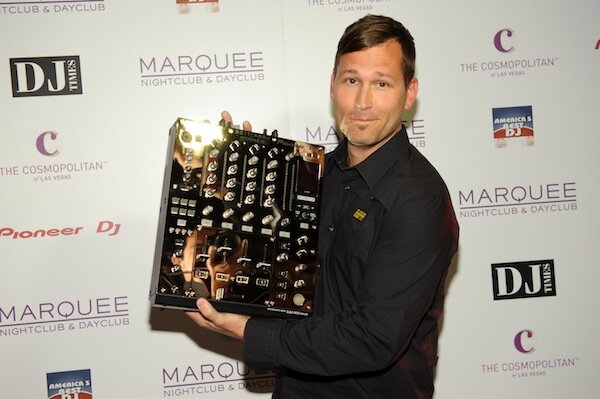 Kaskade receives an award for being voted America's #1 DJ at Mar